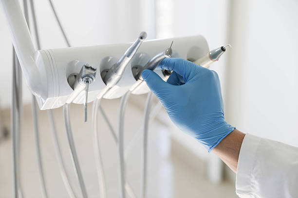 Professional Emergency Dentist technician working in Lake Camelot, WI